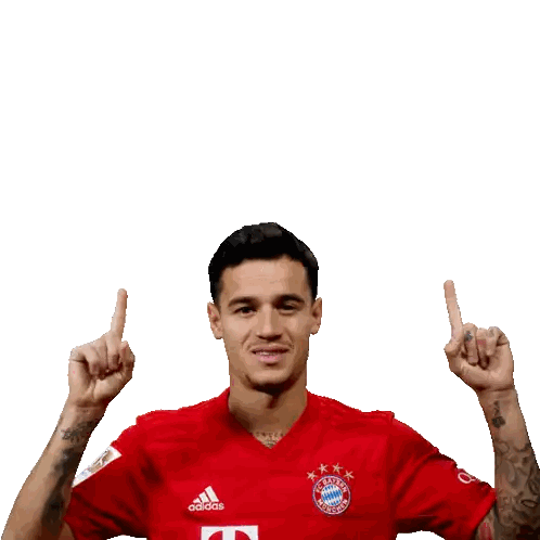 Man in Red Adidas Shirt Holding Up Fingers