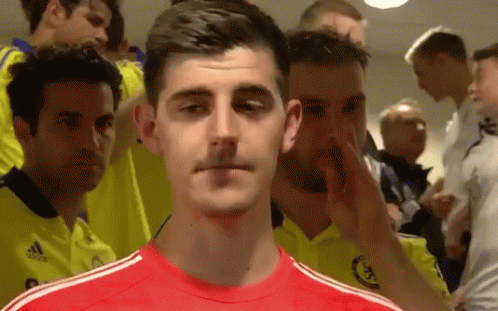 Man In Red Adidas Shirt In Front Of Crowd GIF