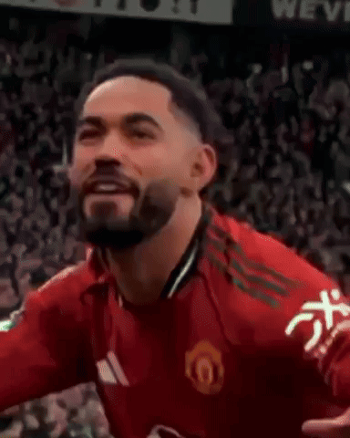 Man in Red Adidas Shirt Laughing and Tongue Out