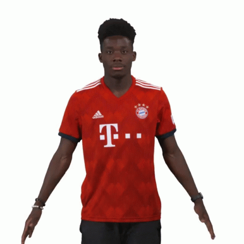 Man in Red Adidas Shirt with Letter T
