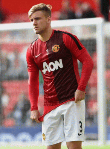 Man in Red and Black Aon Jersey