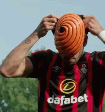 Man in Red and Black Dafabet Jersey