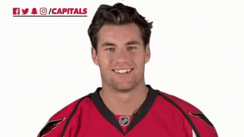 Man In Red And Black Jersey Giving Thumbs Up GIF