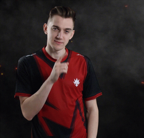 Man in Red and Black Shirt with Leaf