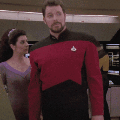 Man in Red and Black Star Trek Uniform
