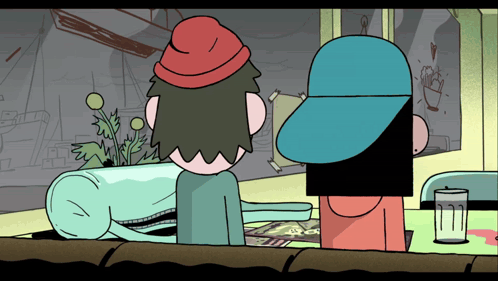 Man in Red and Blue Hats Talking to Another Man