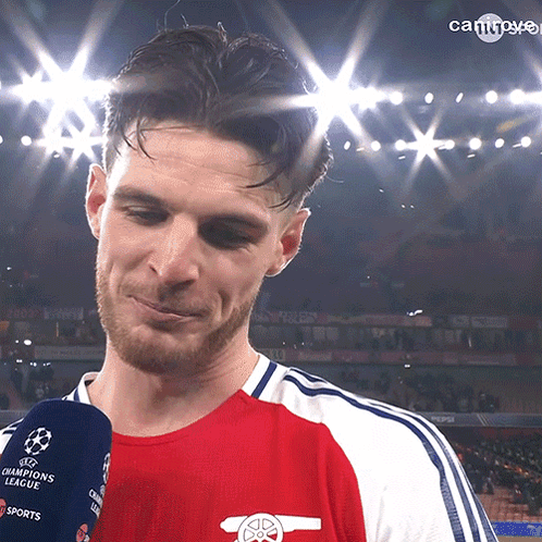 Man in Red and White Champions League Shirt