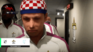 Man In Red And White Checkered Hat Hallway GIF
