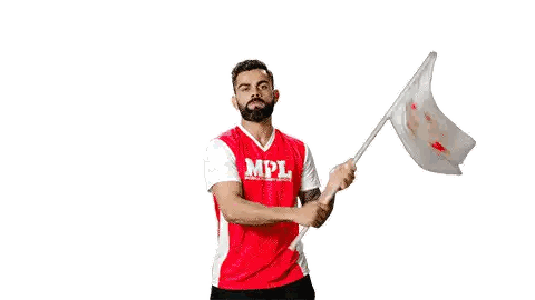 Man in Red and White Jersey Holding Flag