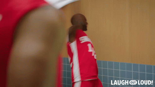 Man in Red and White Jersey Number 1