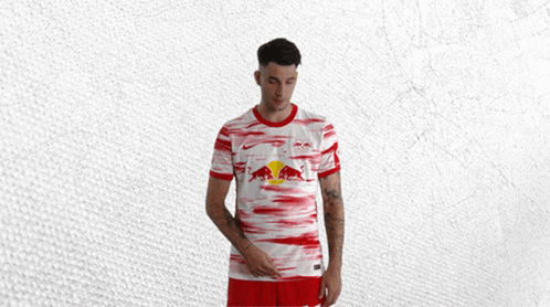 Man In Red And White Jersey With Red Bull GIF