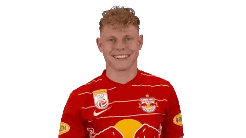 Man in Red and White Jersey with Red Bull