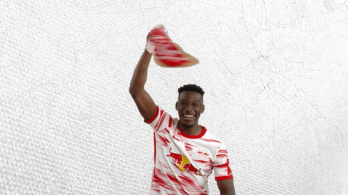 Man In Red And White Shirt Holding Scarf With Letter R GIF
