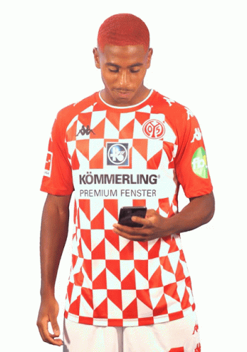 Man in Red and White Shirt Saying Kommerling