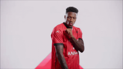 Man in Red and White Shirt With Aon