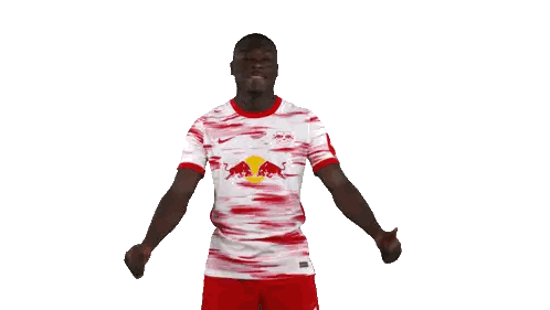 Man in Red and White Shirt with Red Bull