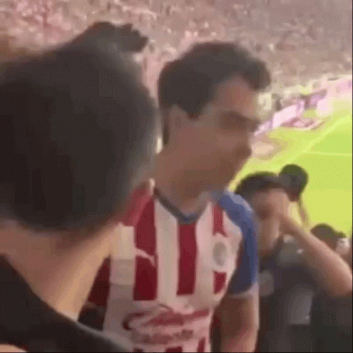 Man in Red and White Striped Shirt