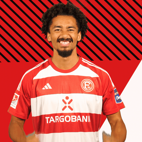 Man In Red And White Striped Shirt Targobank GIF