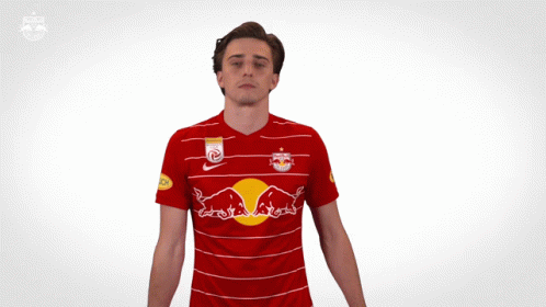 Man In Red And White Striped Shirt With Red Bulls GIF