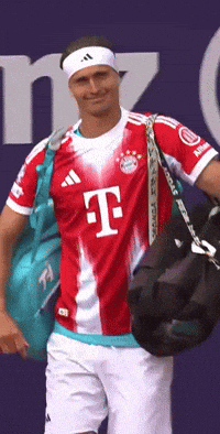 Man in Red and White T-Mobile Jersey