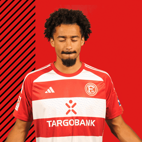 Man In Red And White Targobank Shirt GIF