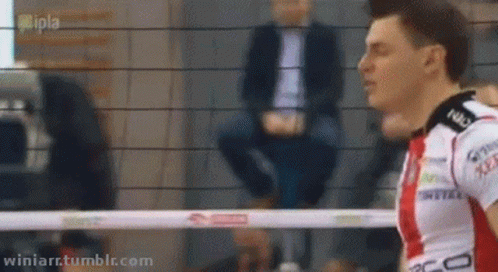 Man In Red And White Volleyball Uniform Saying Metals GIF