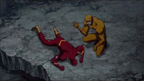 Man in Red and Yellow Superhero Costume Laying on Ground