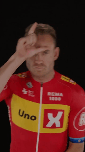 Man in Red and Yellow Uno X Jersey