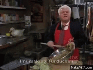 Man In Red Apron Says I'm Making Turducken GIF