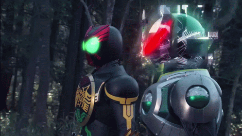 Man in Red Armor Next to Robot