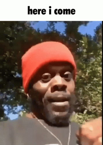 Man in Red Beanie Says Here I Come