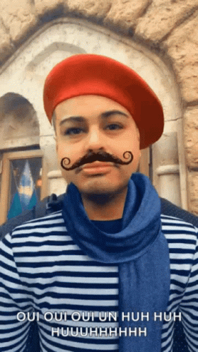 Man In Red Beret, Blue Scarf, Mustache GIF