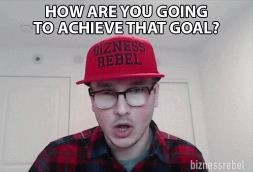Man in Red Bizness Rebel Hat