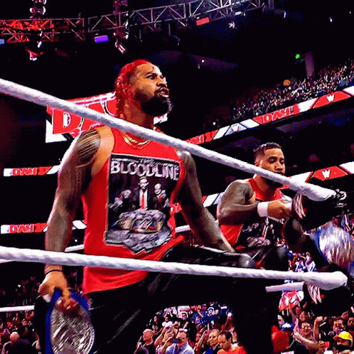 Man in Red Bloodline Tank Top in Ring