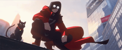 Man in Red Cape Sitting on Roof Next to Cat