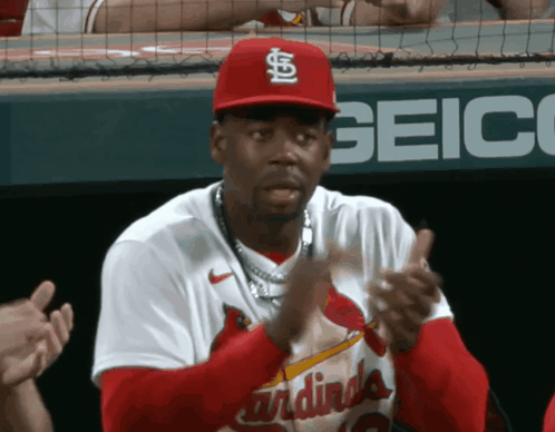 Man in Red Cardinals Jersey Clapping