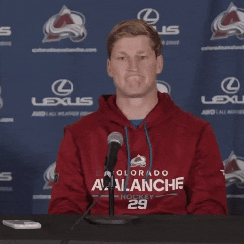 Man in Red Colorado Avalanche Sweatshirt