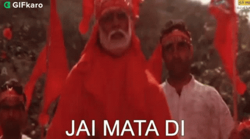 Man in Red Costume Says Jai Mata Di