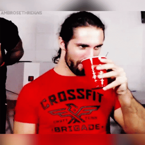 Man in Red Crossfit Brigade Shirt