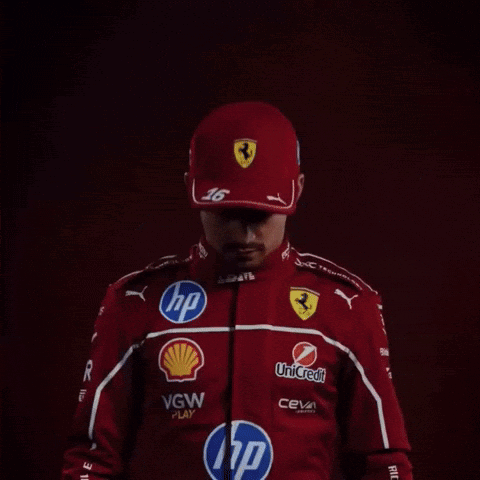 Man in Red Ferrari Racing Suit