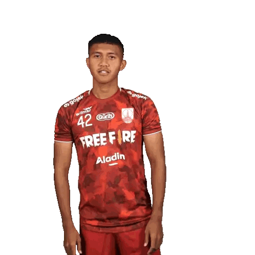 Man in Red Free Fire Jersey Holding Shoes