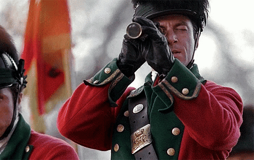 Man In Red-Green Military Uniform Using Telescope GIF
