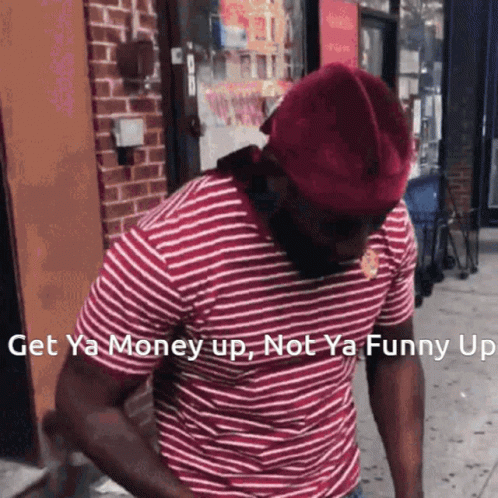 Man in Red Hat and Striped Shirt Says Get Ya Money Up