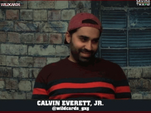 Man in Red Hat and Striped Shirt