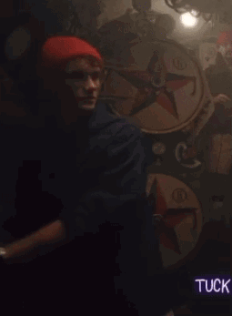 Man in Red Hat and Watch