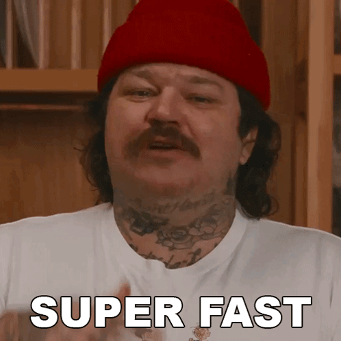 Man in Red Hat and White Shirt Saying Super Fast