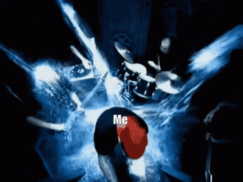 Man In Red Hat Kneeling At Drum Set Saying Me GIF