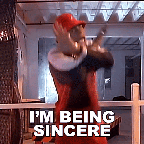 Man in Red Hat Saying I'm Being Sincere