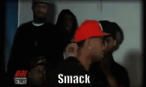 Man In Red Hat Saying Smack GIF
