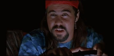 Man in Red Hat Says Slurpee in Dark Room